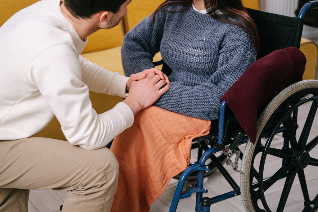 Man holding woman s hands